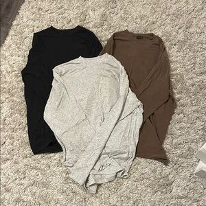 SKIMS Long Sleeve Tees - Black, Gray, and Brown